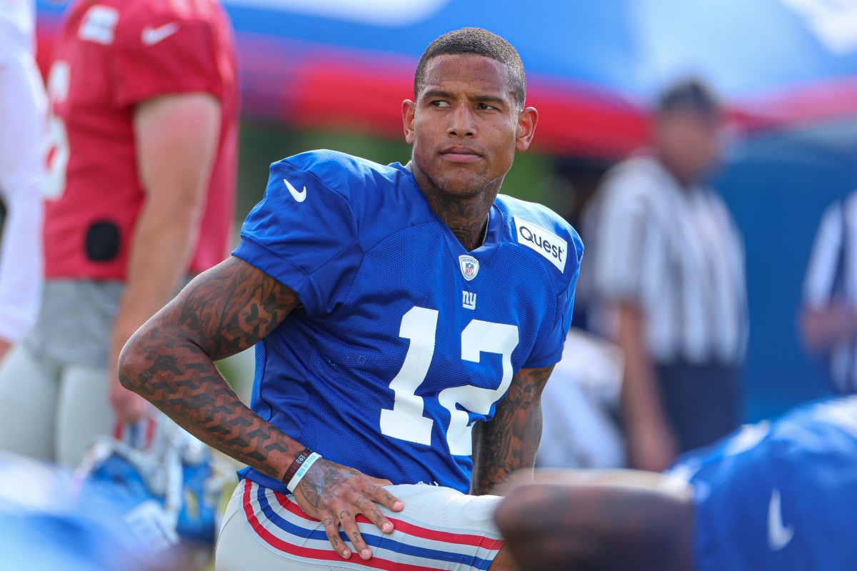 Aug 1, 2023; East Rutherford, NJ, USA; New York Giants tight end Darren Waller (12) stretches during training camp at the Quest Diagnostics Training Facility.